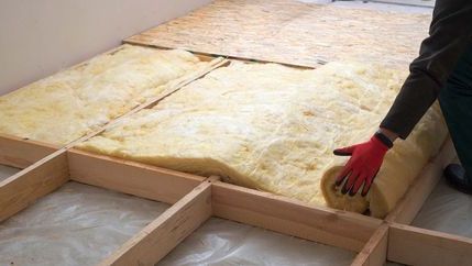 Loft insulation being installed
